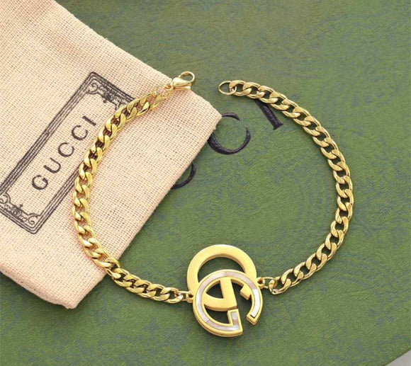 Gold G bracelet